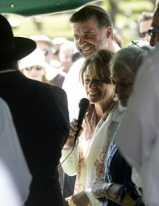 From left, Conservative Rabbi Marc Soloway, Renewal Rabbi Tirzah Firestone, and Reb Zalman's wife, Eve Ilsen, at grave site.